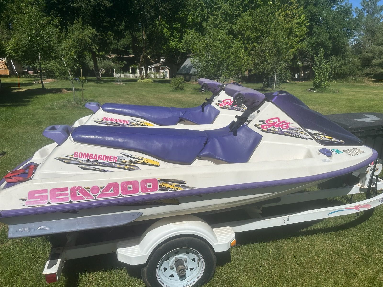 two 1999 seadoo waverunners and trailor