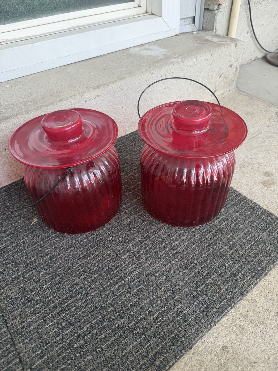 Set of 2 Vintage Red Ribbed Glass Jars with Lids and Wire Handles
