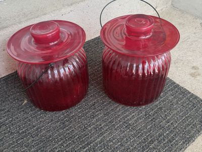 Set of 2 Vintage Red Ribbed Glass Jars with Lids and Wire Handles