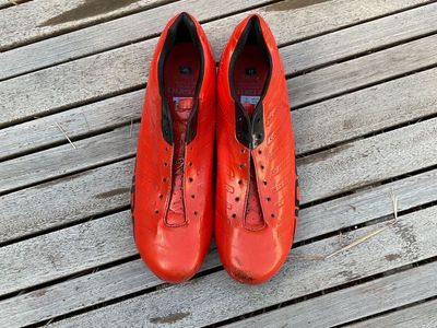 bright orange road biking shoes