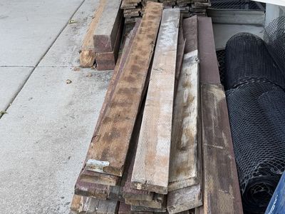 Good used pressure treated fence lumber