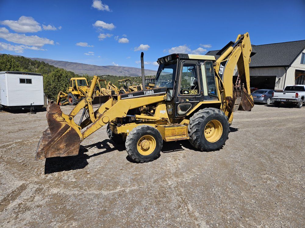 1996 CAT 436B Backhoe - 4x4 full cab, reman engine