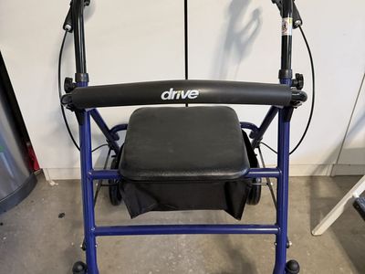 Walker with seat and carryall