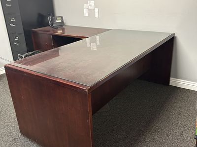 Office desk with glass top and arm return and chair