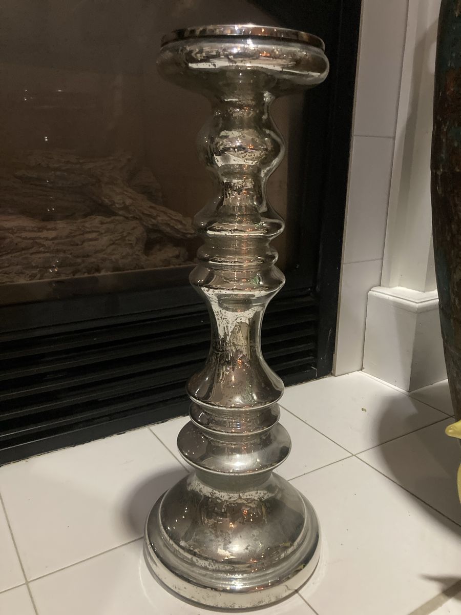 Large shiny candle stick holder