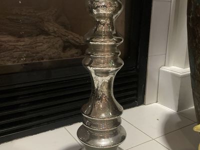 Large shiny candle stick holder