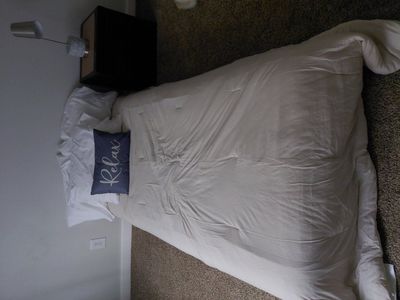 Adjustable rail free hospital bed