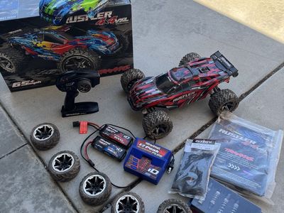 Traxxas Rustler 4X4 VXL RC Truck Bundle w/ Extra Parts, Batteries, and Charger - RTR