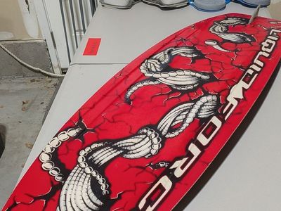 wakeboard and 2 pairs of boots