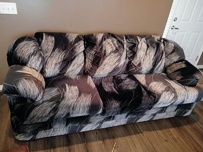 Couch, Love seat, Tea Table, and Entertainment Center