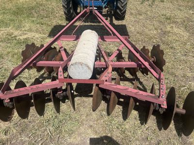 Farm field disc and drag.