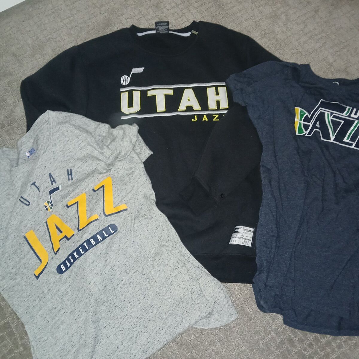 Utah Jazz shirts. 2 T-shirts and a sweatshirt.
