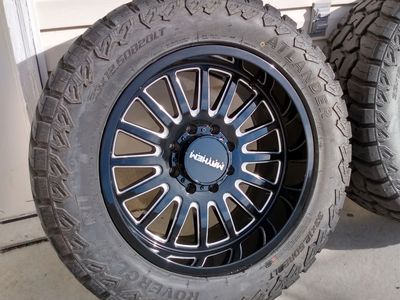 8x6.5 20x10 Mayhem wheels and 33x12.50R20 tires