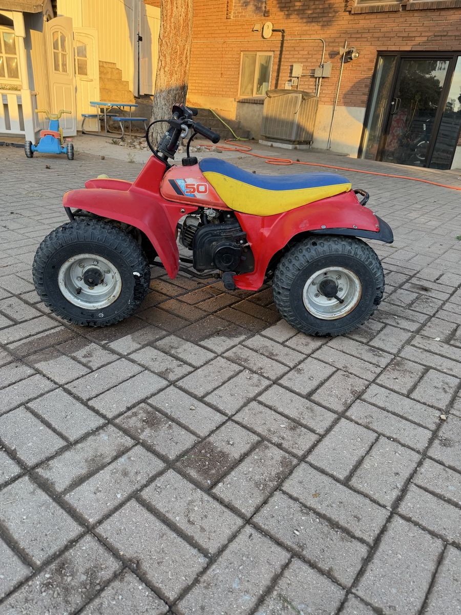 Suzuki  50cc Kids Quad ATV - Red, Yellow & Blue Seat, Pull Start (Idling Issues)