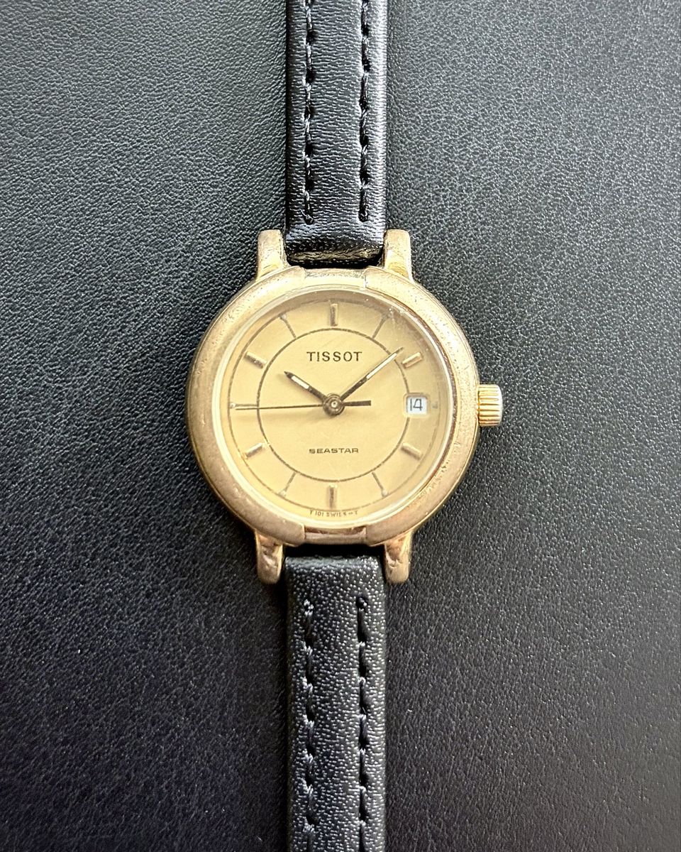 Vintage Tissot Seastar T 101 Swiss Quartz Gold Tone Champagne Dial Date Watch