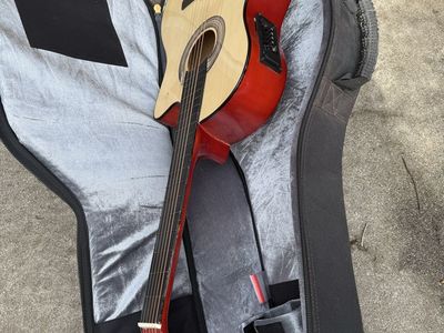 Red Acoustic Guitar with Case - Autographed, Good Condition