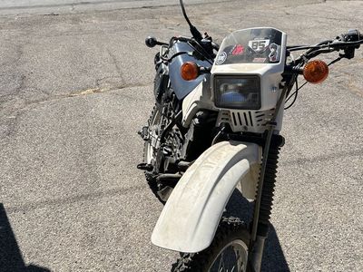 Kawasaki KLR250 1985 title in hand
