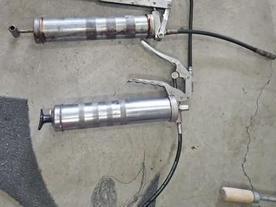 2 ea used Grease guns with grease