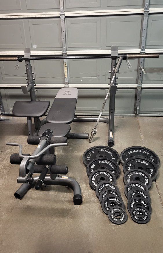 Bench and 255 pounds of weights