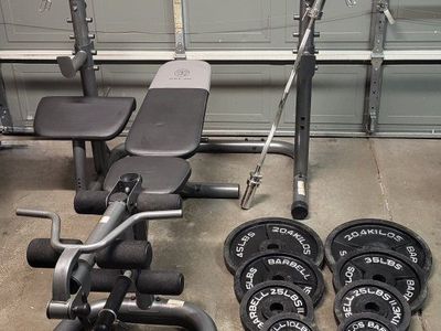Bench and 255 pounds of weights