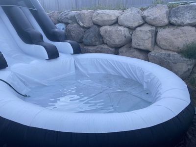 Used Inflatable Water Slide with Pool - Black & White, Great for Summer Fun