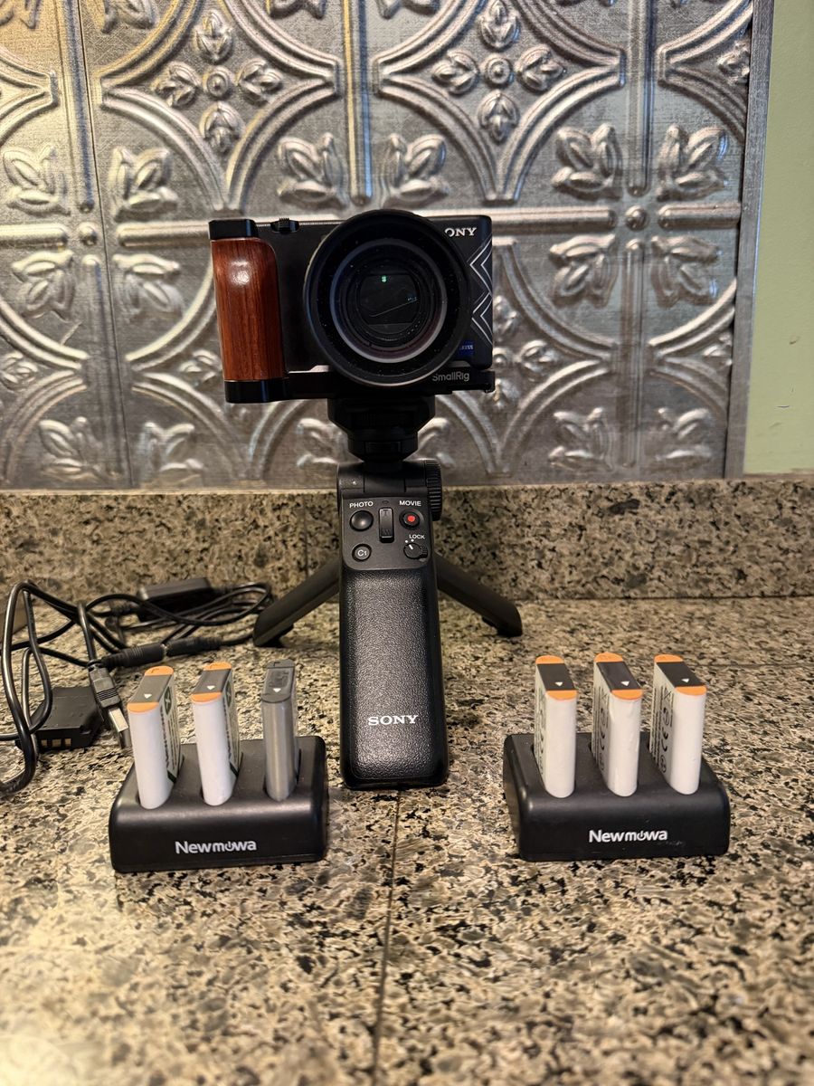 Sony ZV-1 4k Camera with Sony Wireless remote grip/tripod , SmallRig Cage,  batteries, 2 chargers, 1 dummy battery 