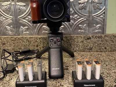 Sony ZV-1 4k Camera with Sony Wireless remote grip/tripod , SmallRig Cage, batteries, 2 chargers, 1 dummy battery