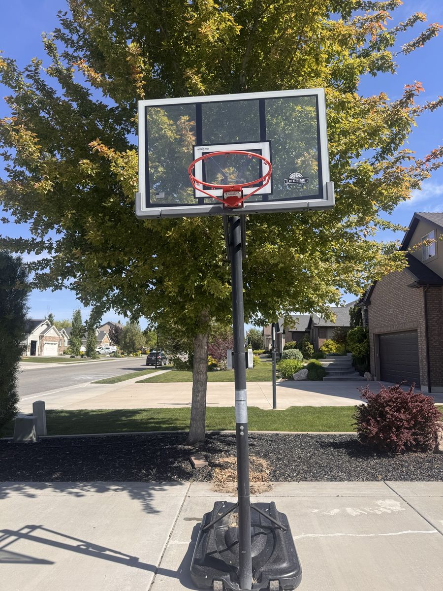 Adjustable basketball stand