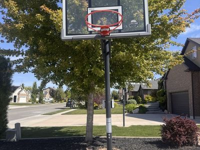Adjustable basketball stand