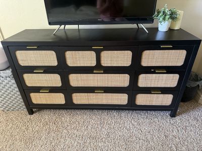 Stylish Black Dresser with Rattan Drawer Fronts and Gold Pulls - Modern Storage Cabinet