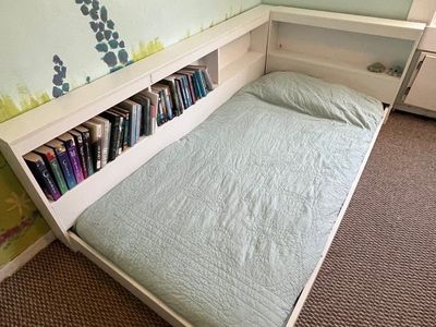 Space-Saving White Bedframe with Integrated Bookshelves - Perfect for Small Rooms