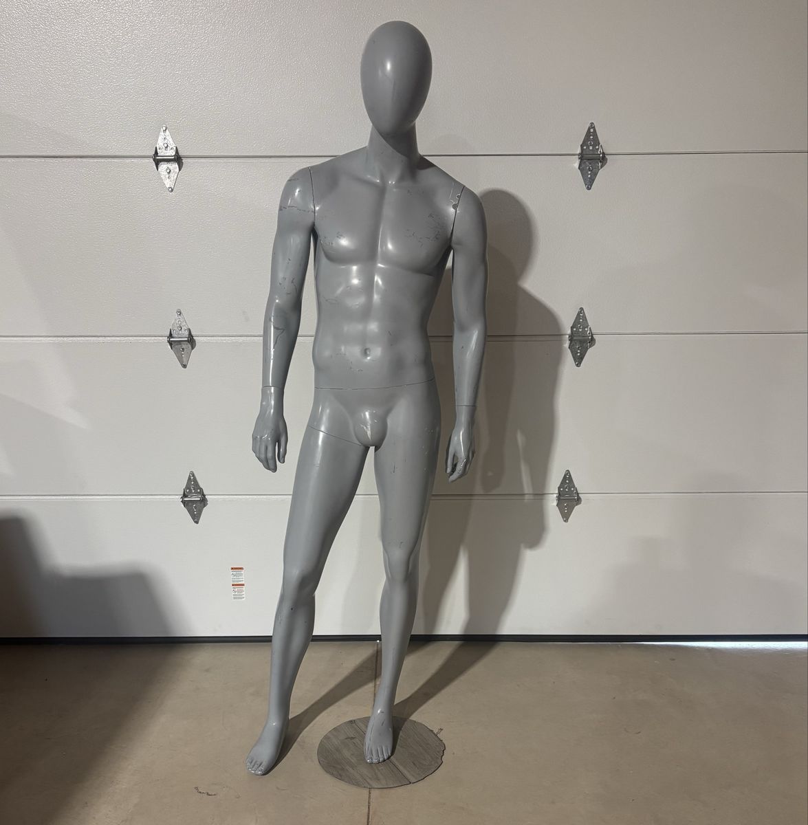Standing adult male mannequin with athletic build (includes floor stand)