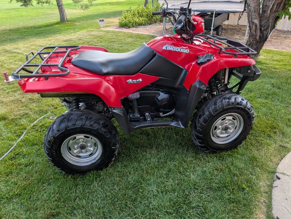 Two four wheelers and two trailers.
