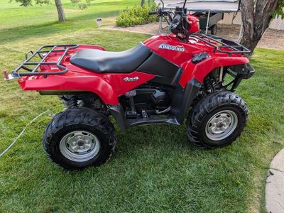 Two four wheelers and two trailers.