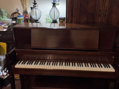 Conover piano with free delivery and free home tuning