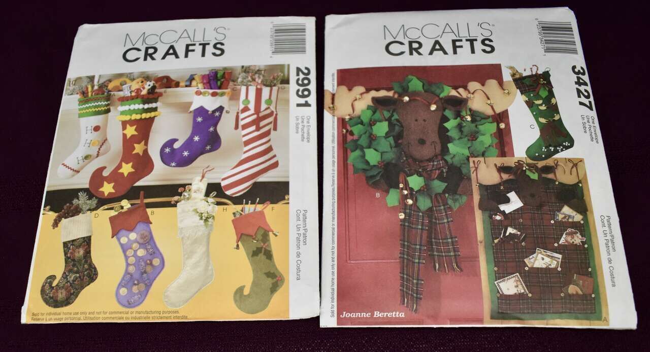 Two Separate McCalls Sewing Patterns For Making Several Kinds Of Christmas Socks, Deer Wreath / Christmas Card Holder