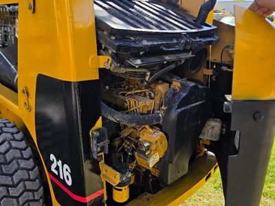 Cat 216- comes with trailer