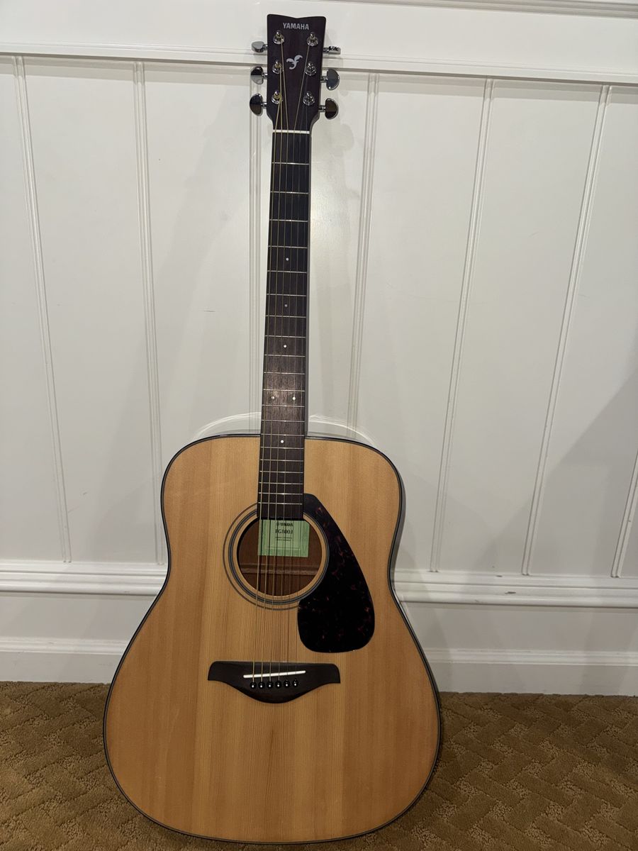 Yamaha Acoustic Guitar with Capo