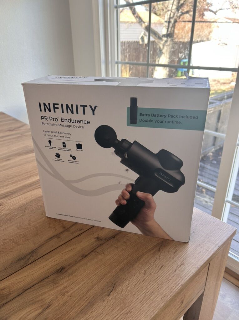 BRAND NEW UNOPENED! Infinity Massage Gun