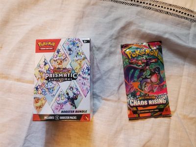 Pokémon TCG Scarlet & Violet Prismatic Evolutions Booster Bundle & Chaos Rising Pack