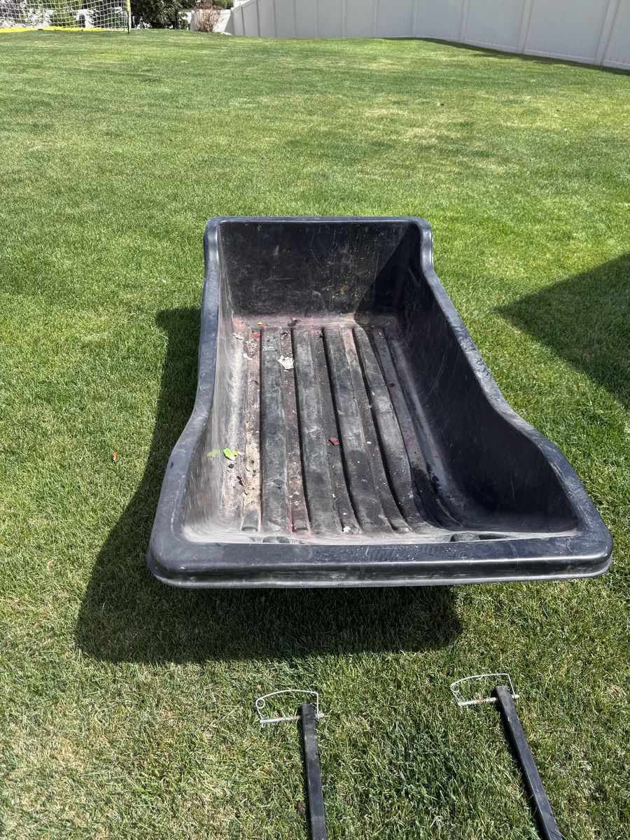 Towable ice fishing sled