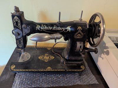 Antique White Rotary Sewing Machine with Wood Desk Cabinet
