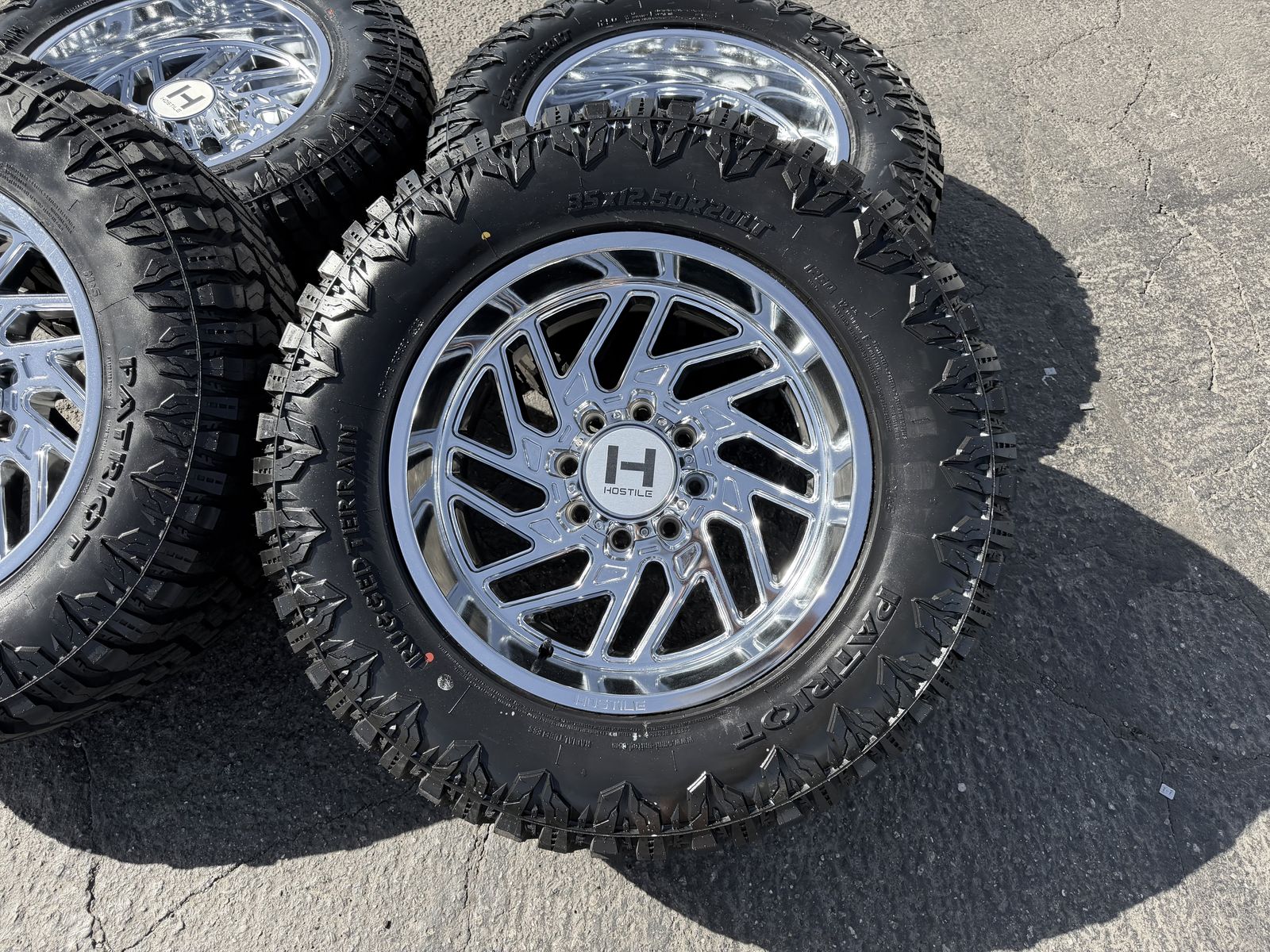 20x10 Hostile H116 Chrome 8 Lug 8x6.5 35x12.50R20