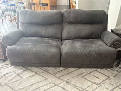 Gray Dual Reclining Sofa and Loveseat with Nailhead Trim