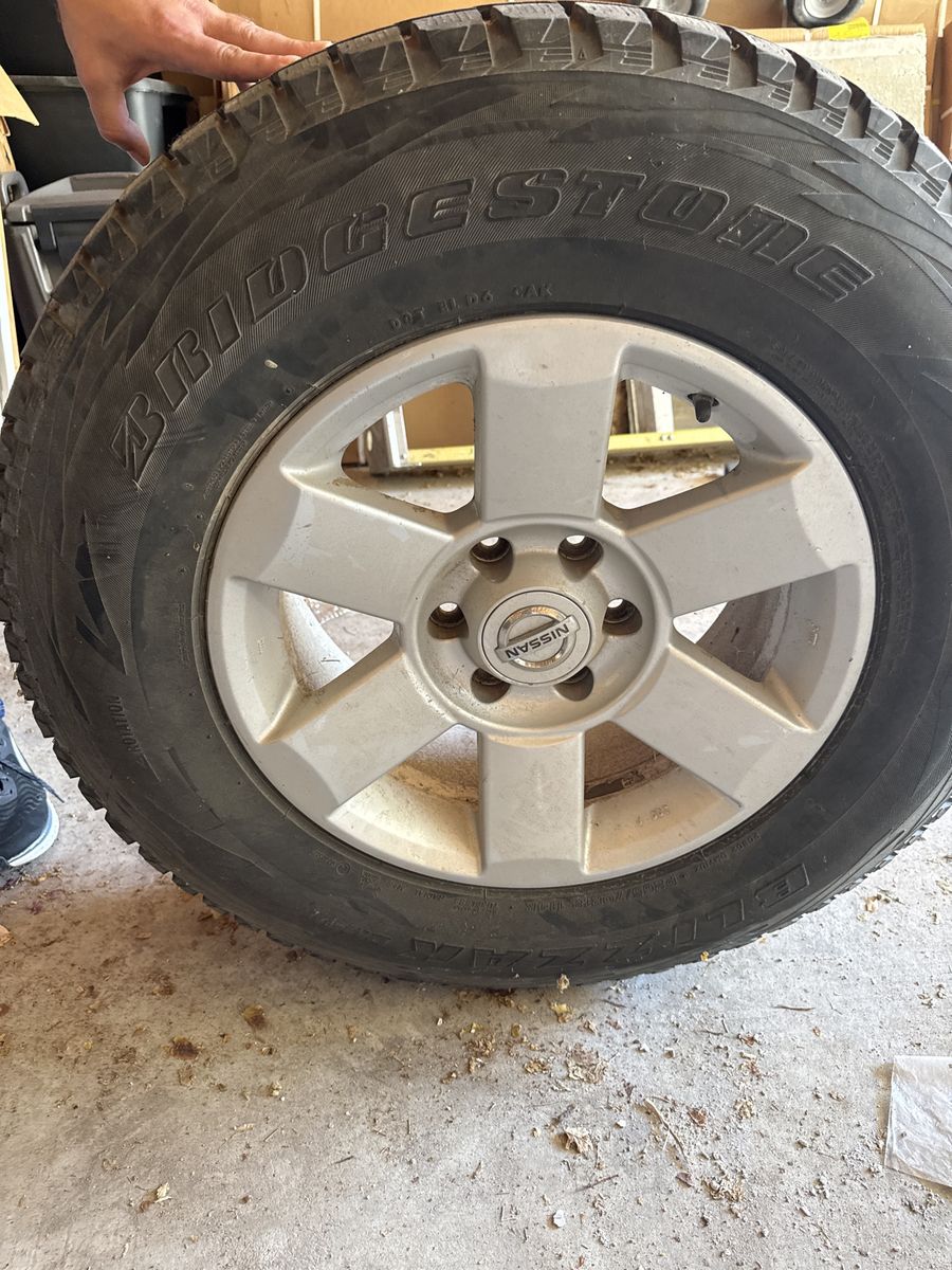 Bridgestone Blizzak 245/75R16 Tire with Nissan 6-Lug Wheel x 3 and 4 rims