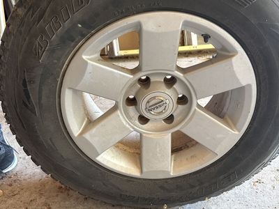 Bridgestone Blizzak 245/75R16 Tire with Nissan 6-Lug Wheel x 3 and 4 rims