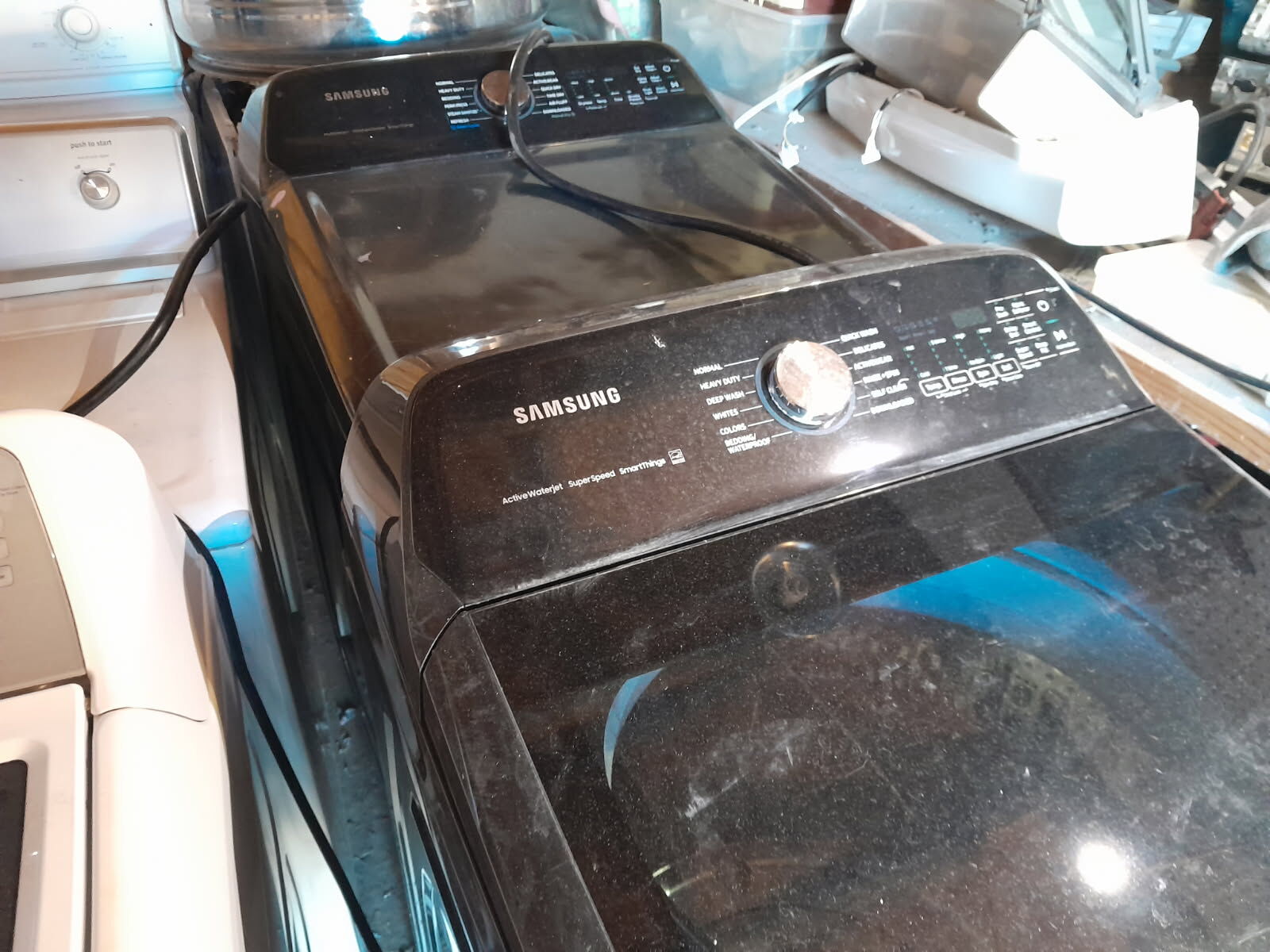 Beautiful  Black Samsung Top Load Washer and Electric Dryer