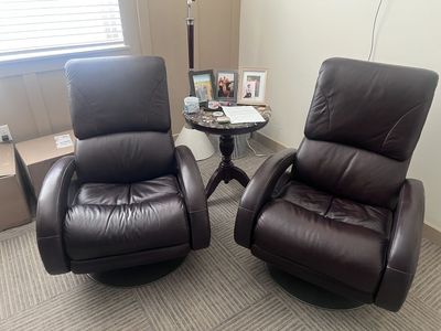 Leather swivel recliners (two)