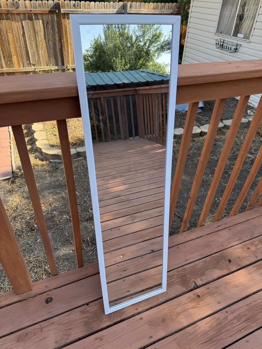 Mirror with plastic frame