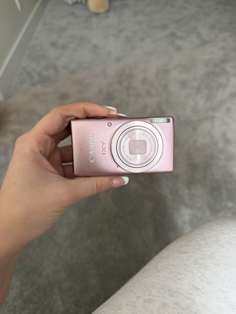 pink canon IXY camera